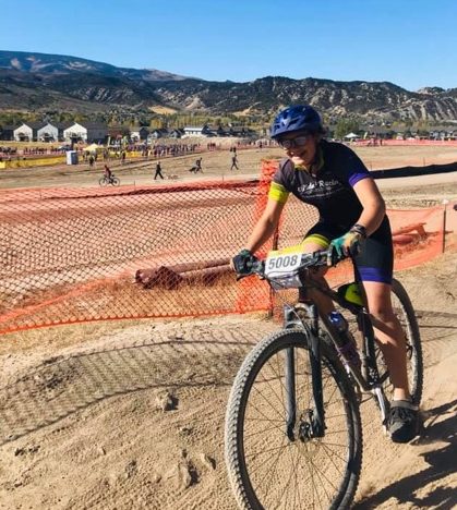 Salida Racing member, Seda Condell, rides her bike at a mountain bike race last season. She among others, love riding the Soltice trail on Methodist which is being threatened by the gravel mine expansion.