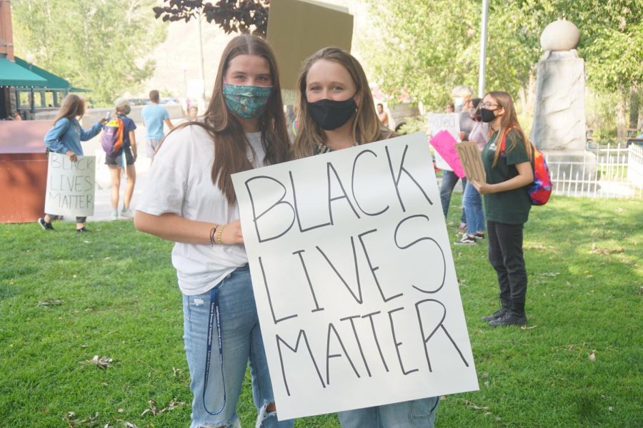Seniors Saige Ferguson, left and Norah Blackburn, right show off their BLM poster. All of the students and community members stood peacefully. Though there was some opposition from other Salidans, the protesters didn’t engage. 

Wierdsma said, “I had a whole spiel that I gave to everyone and said, ‘People get bored. They will leave if we are quiet.’ We just didn’t engage with them and they left because they got bored and weren’t getting anything out of it.” 

The group did as they planned and stayed away from any violence or engagement with others. 
