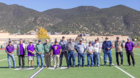 The Salida High School 1971 football state champions stand for a photo at their reunion game on October 16, 2021.