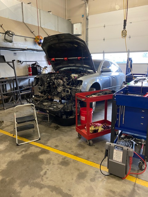 ADDITIONS TO AUTO: A car sits in the SHS auto shop, ready to be worked on by students.